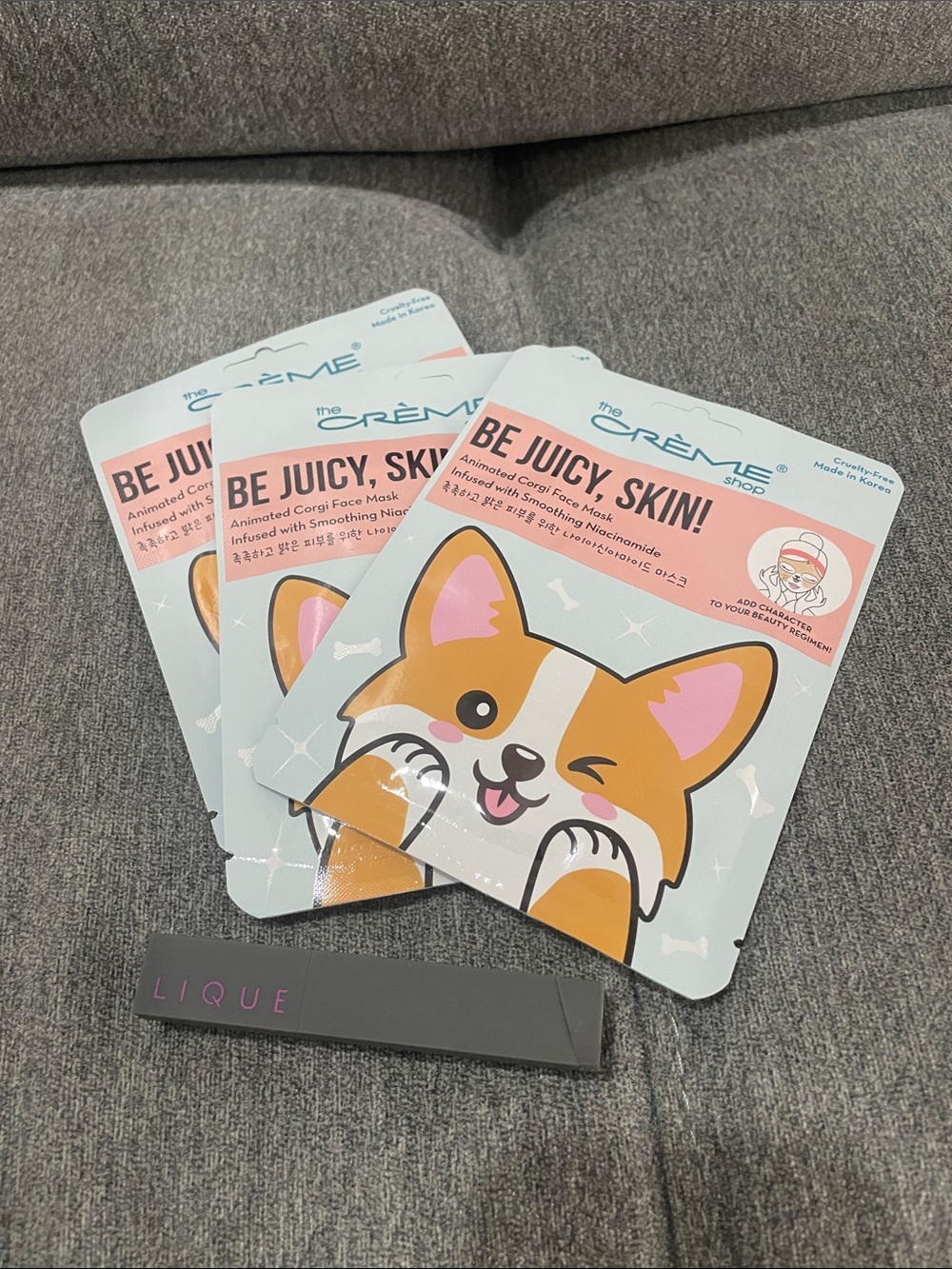 The Creme Shop Be Juicy Skin! Corgi Face Mask and a lipstick